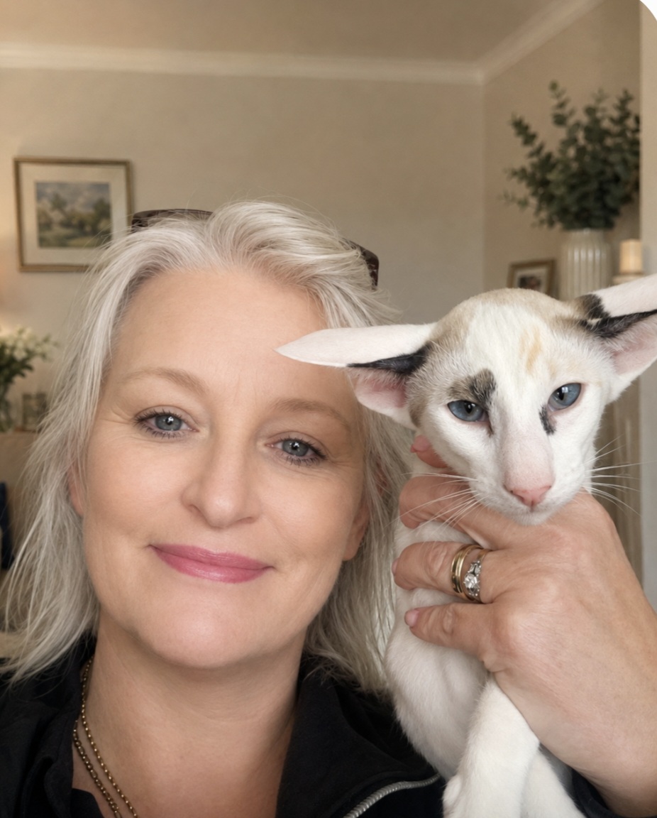 Sharon Taylor holding a Tinkertaylor Oriental kitten